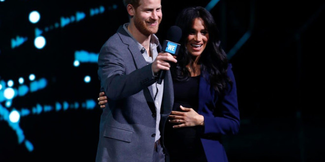 Meghan Markle Surprises Crowd by Joining Prince Harry Onstage at Charity Event